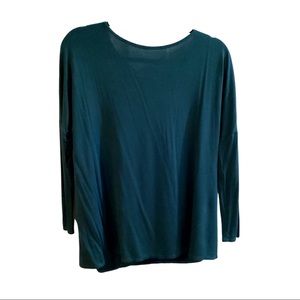 Dark green long sleeved loose fitting blouse